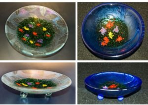 SPRING IMPRESSIONS 10" and 5" iridized glass bowls with glass powder designs and sand carved undersides.