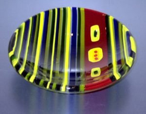 LINEAR LIGHT Approximately 9"W x 2"D, this footed bowl uses Spectrum blue, green, amber, orange, yellow and clear strips. Cold worked.
